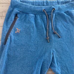 Orangetheory Blue Joggers with Orange plat point Detail. Men’s large